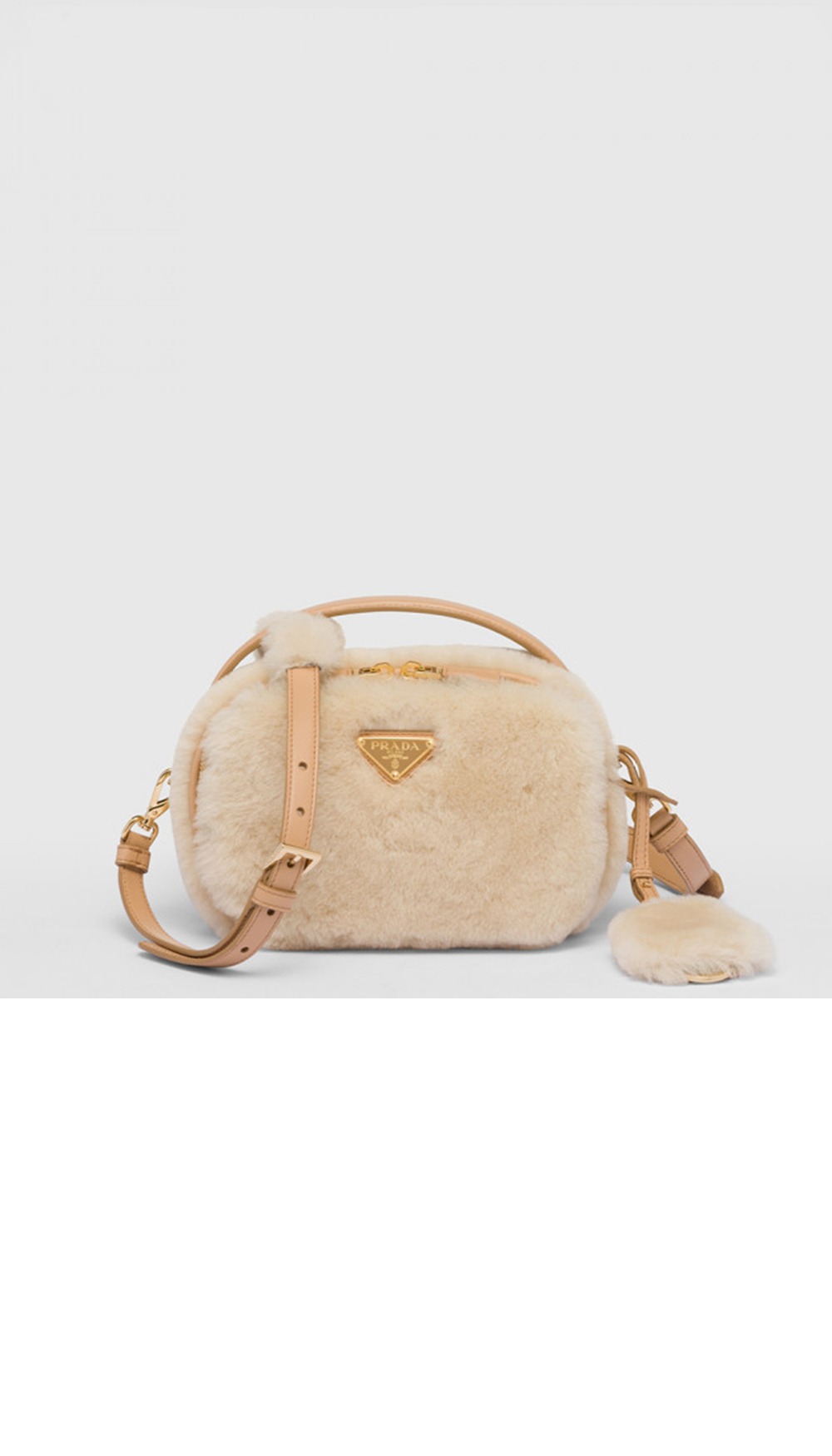 미러급레플리카사이트 | 명품레플리카 전문 쇼핑몰  | 퍼스트원 - 오데트 시어링 미니백 1BH208 > 프라다