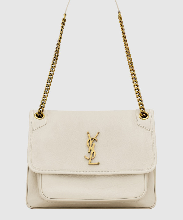 그레인 램스킨 소재의 NIKI 미디엄백 633178